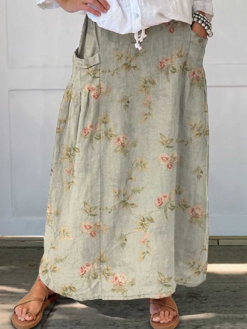 Valenzora | Grüner Rock aus Leinen mit Blumenmuster, Gummizug in der Taille und Taschen für Damen
