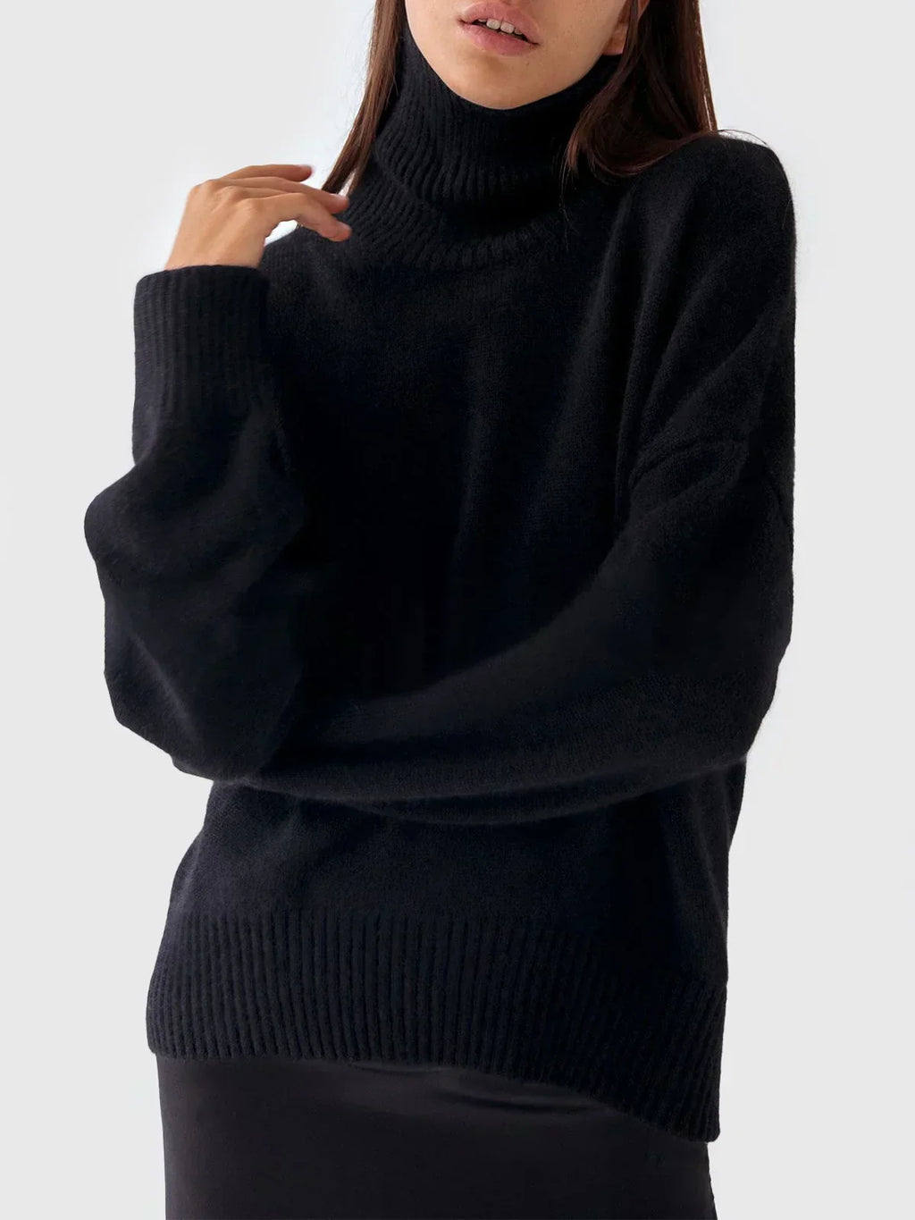– Oversized, loose-fitting turtleneck sweater