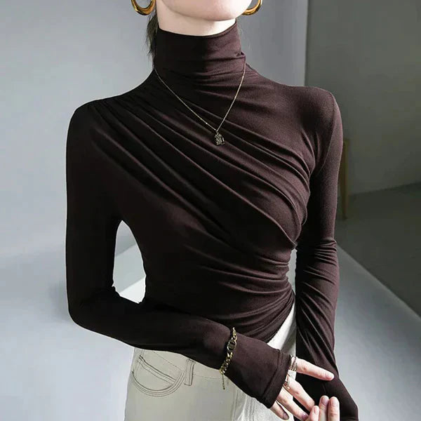 Roll-neck sweater with pleats