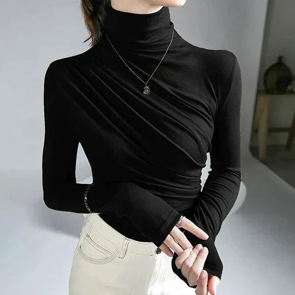 Roll-neck sweater with pleats