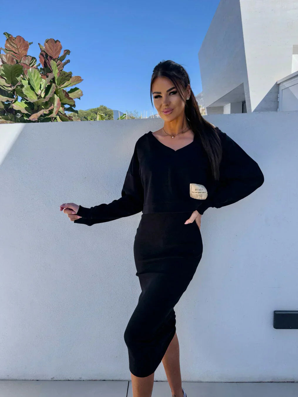 Valenzora | Set consisting of a short sweatshirt and a cotton skirt