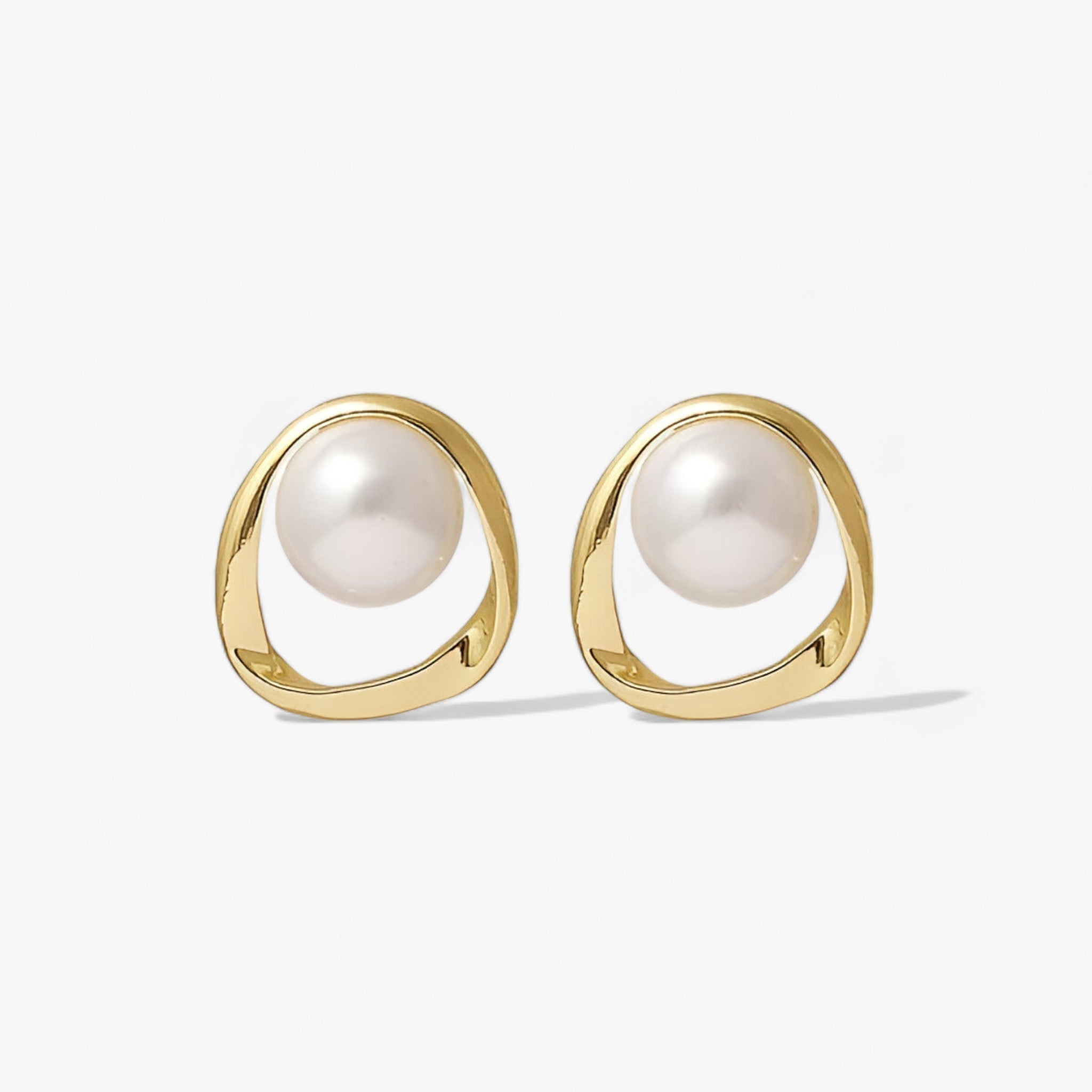 Gold pearl stud earrings - Contemporary elegance for every occasion