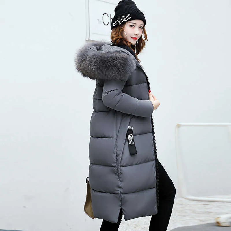 Valenzora | Long jacket with fur collar