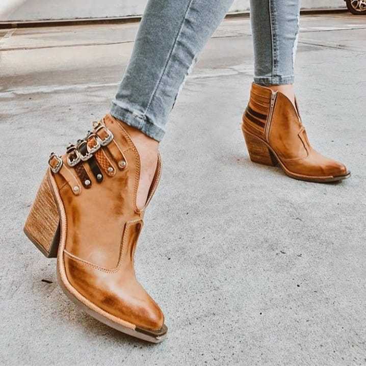 Boots with studs and a thick buckle