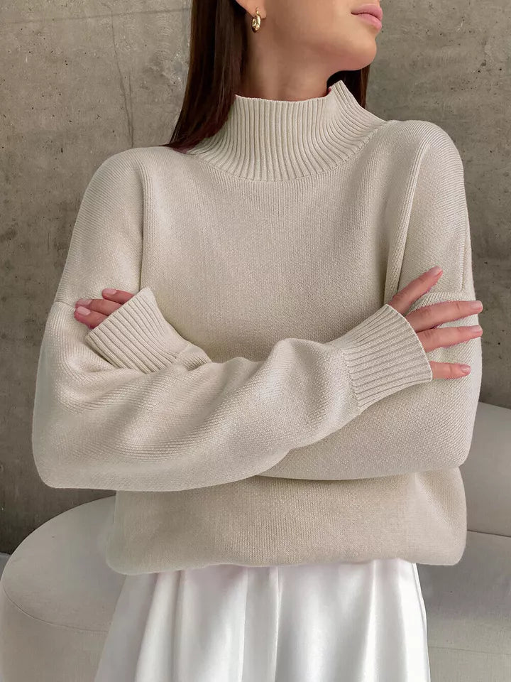 – Oversized, loose-fitting turtleneck sweater
