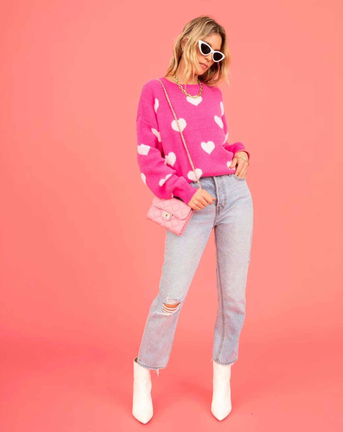 – Knitted sweater with heart print
