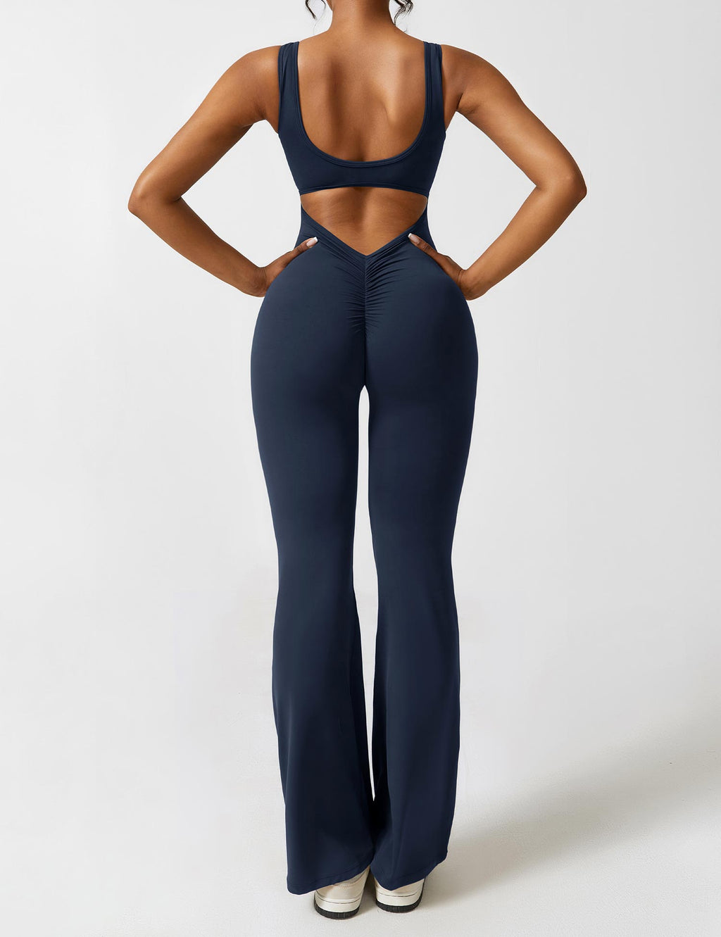 Valenzora | V-back flared jumpsuit