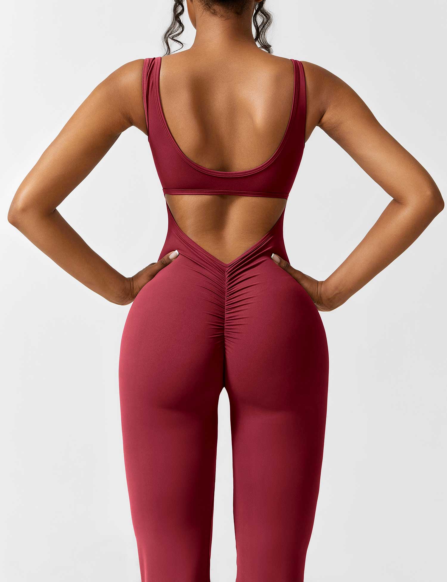 Valenzora | V-back flared jumpsuit